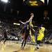 Michigan's Zack Novak(right) and Jake Eastman go up for a rebound as the Michigan men's basketball team took on Bradley at Crisler Arena Thursday December 22, 2011. Michigan won the game 77-66. Jeff Sainlar I AnnArbor.com